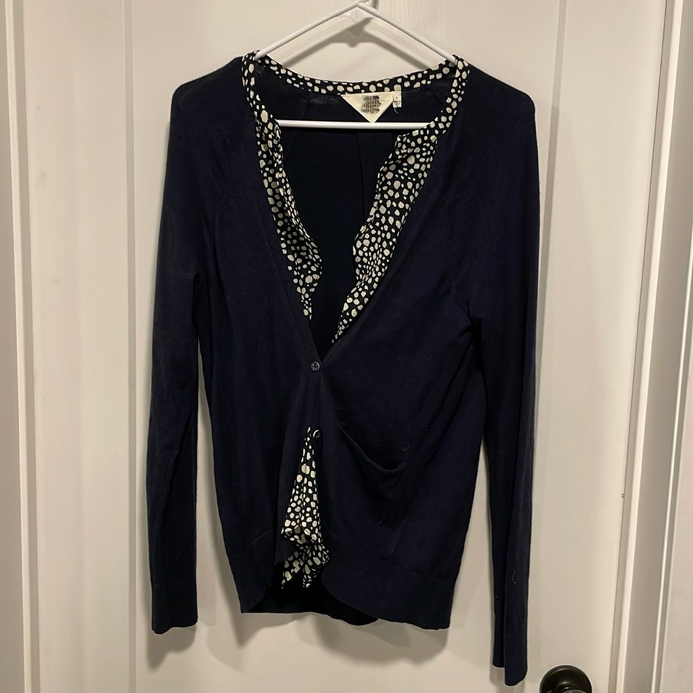 Navy blue cardigan with dot accent and anchor buttons